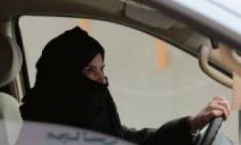 Why is a Saudi girl driving a car on a beach arrested?